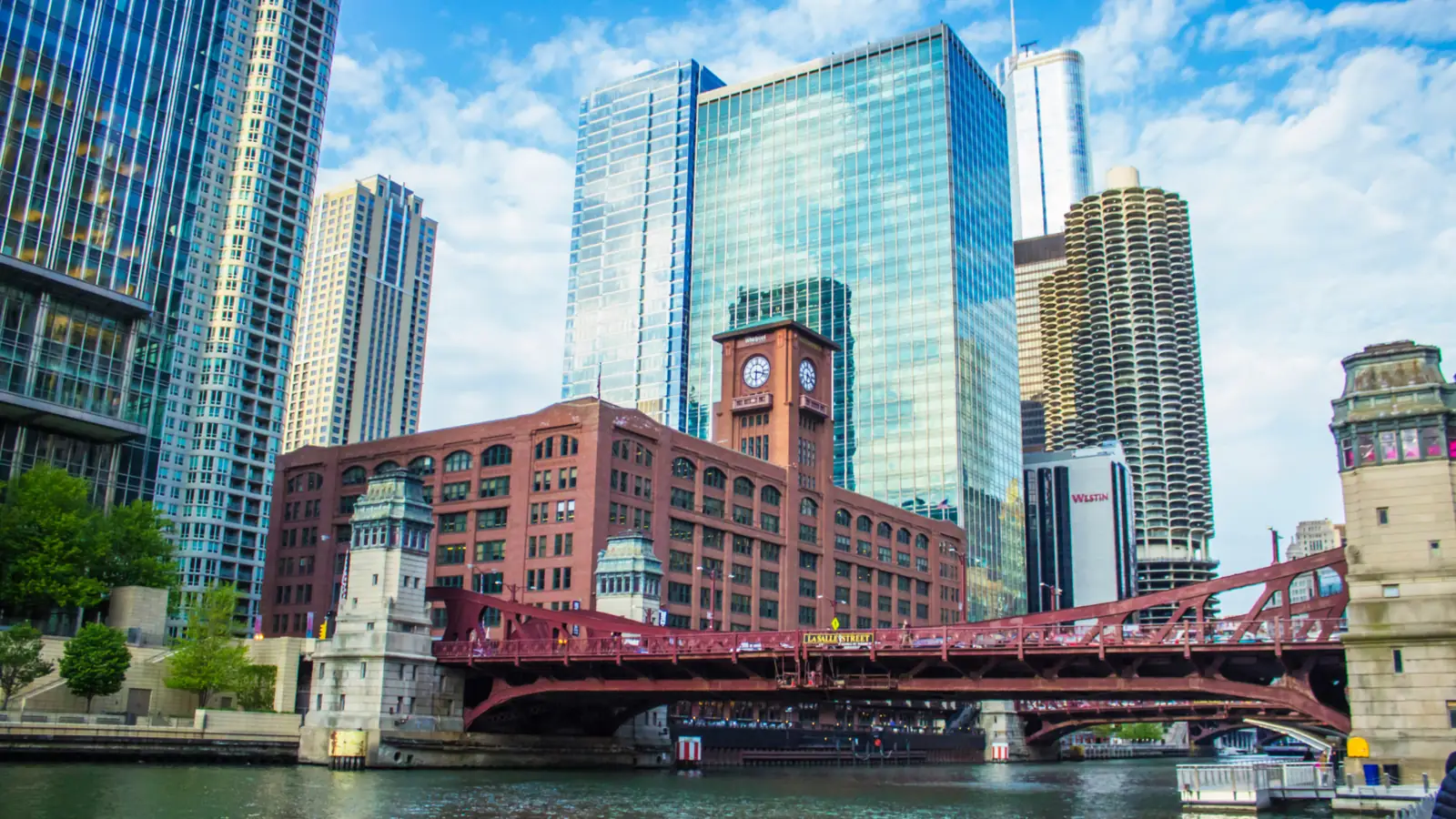 A red bascule bridge and high-rise buildings on the Chicago Riverwalk